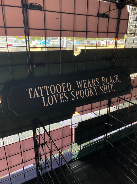 Tattooed. Wears Black. Loves Spooky Shit.