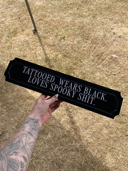 Tattooed. Wears Black. Loves Spooky Shit.