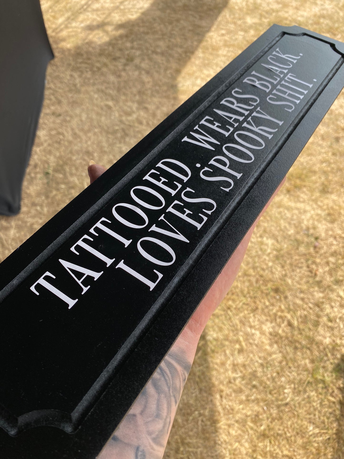 Tattooed. Wears Black. Loves Spooky Shit.